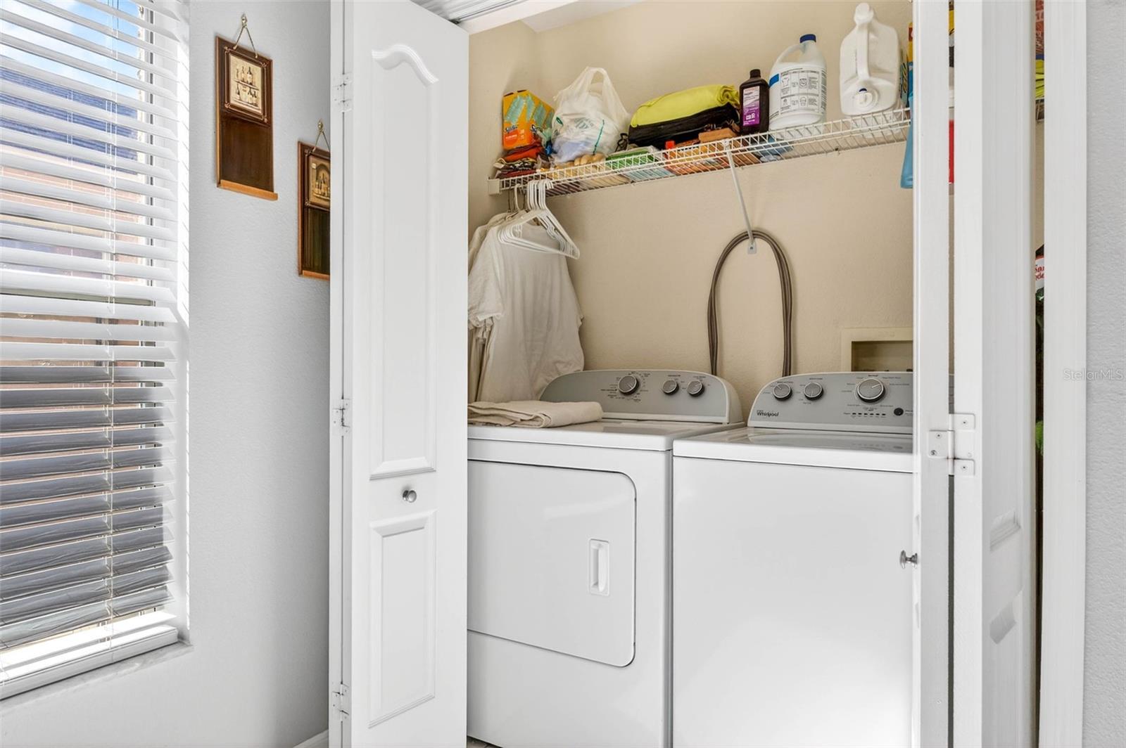 Laundry Closet near Kitchen Eating Area