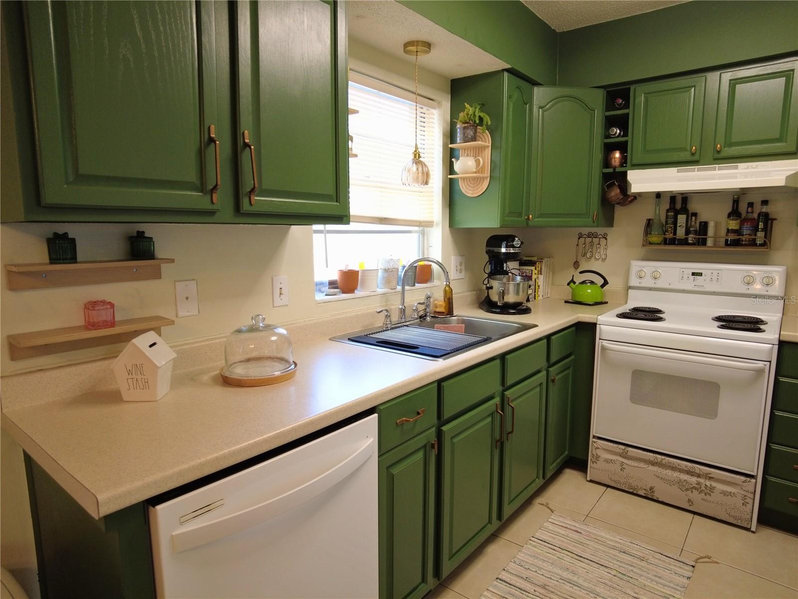 Spacious Kitchen with plenty of cabinets and counter tops.