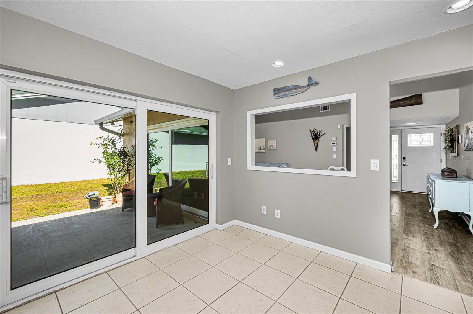 Kitchen Hurricane/Impact sliders to patio