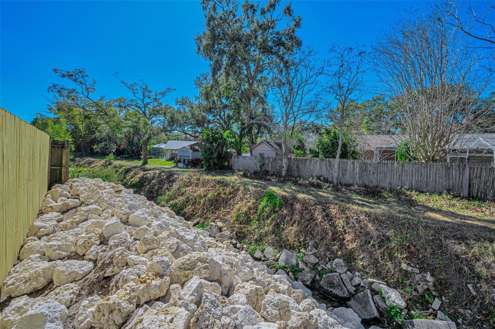 SLOPE TO STREAM ENGINEERED TO PREVENT ANY PROBLEMS.