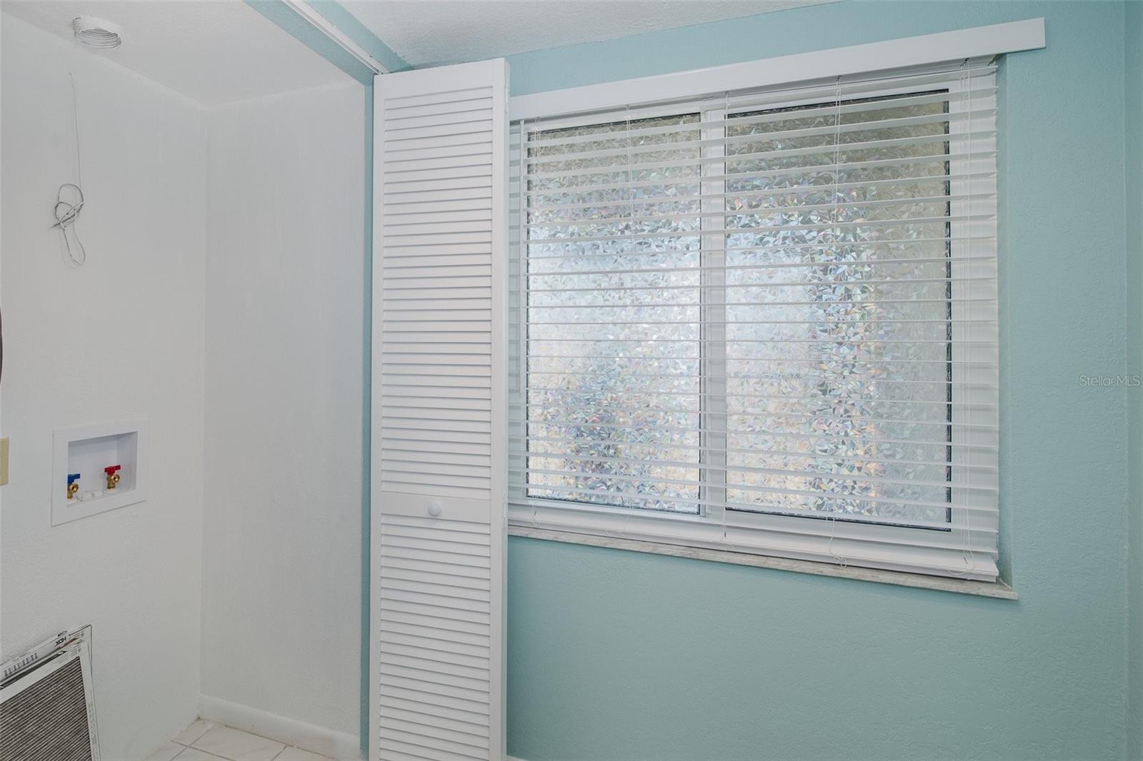 Laundry hook up in kitchen area