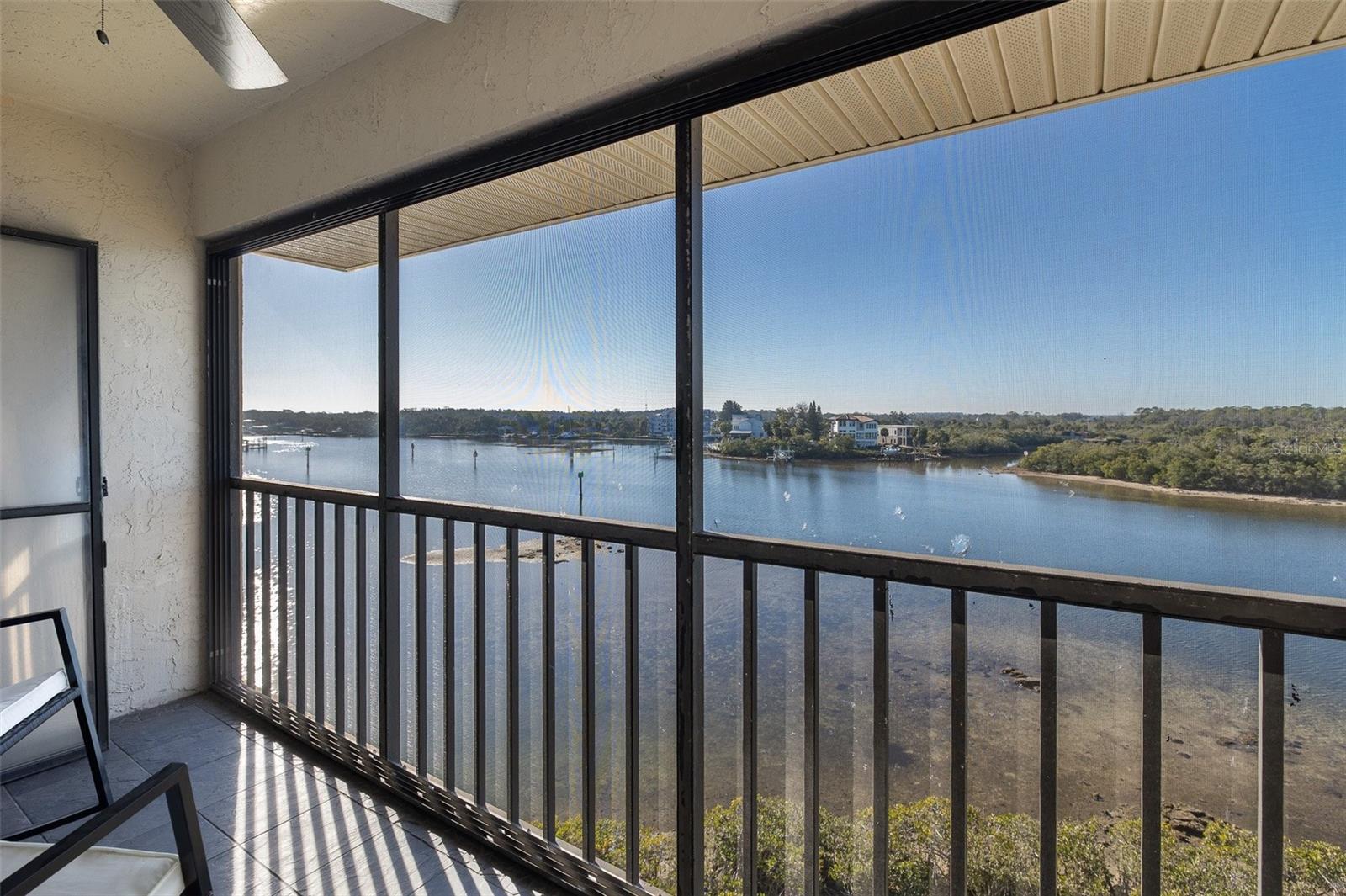 Screened in porch with gorgeous view of the river