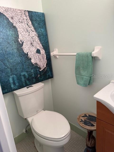 Half Bath Located Between Dining Area and Kitchen