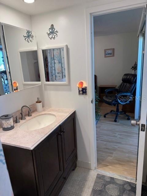 Main Bath Leading Into Bedroom