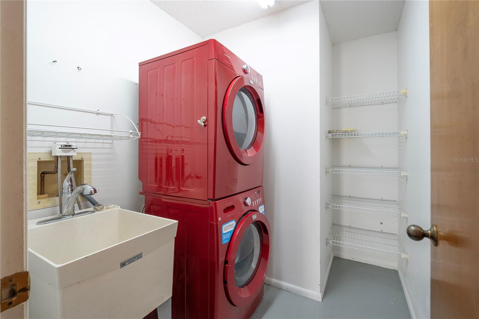 Spacious in unit laundry room with closet
