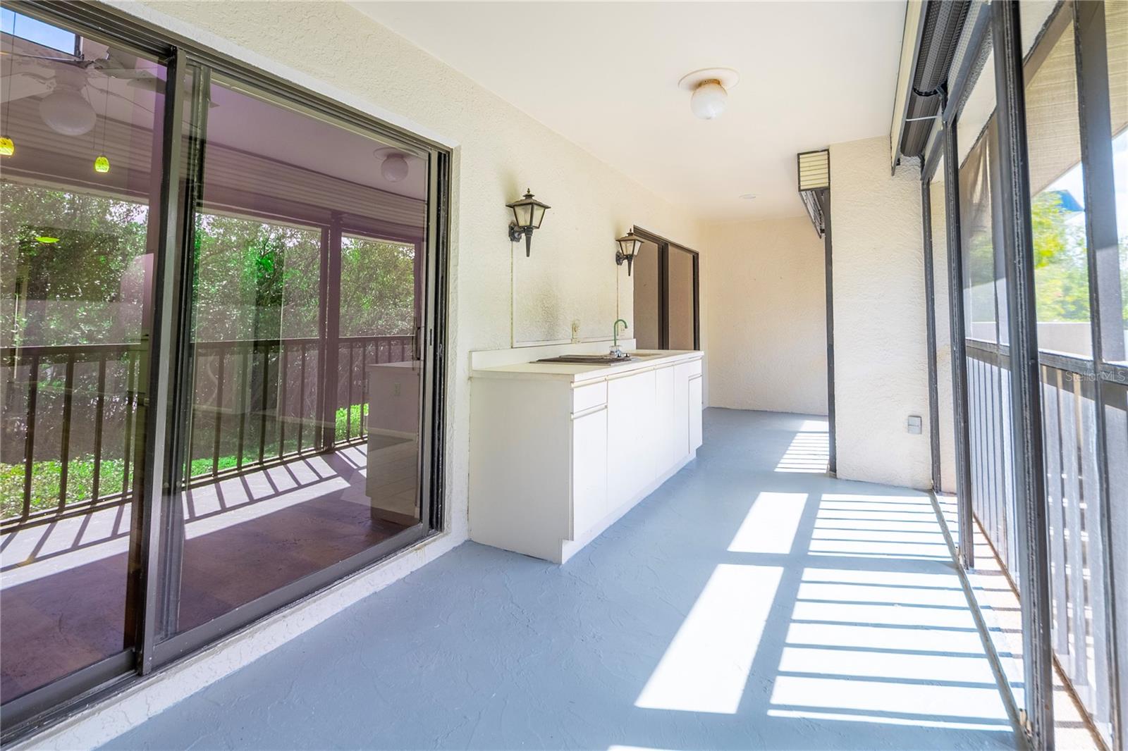 Spacious screened lanai for elegant entertaining.