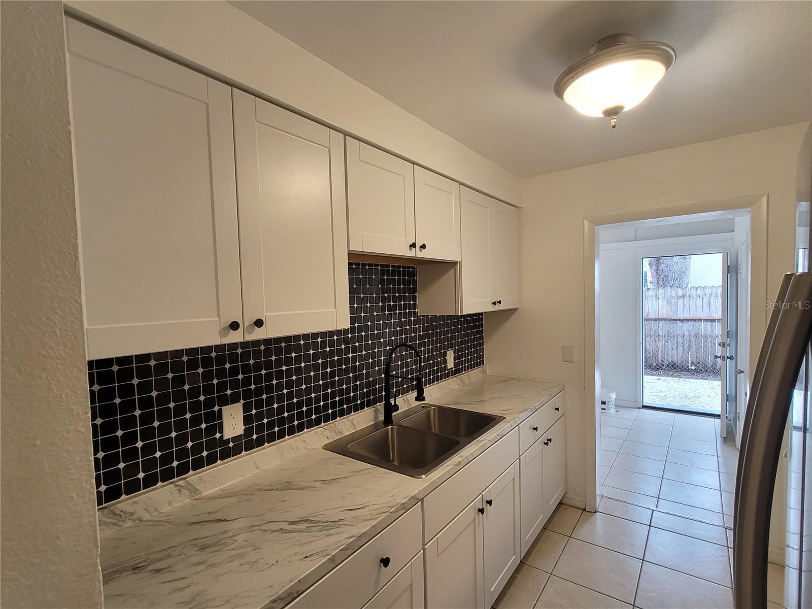 Kitchen with side entrance