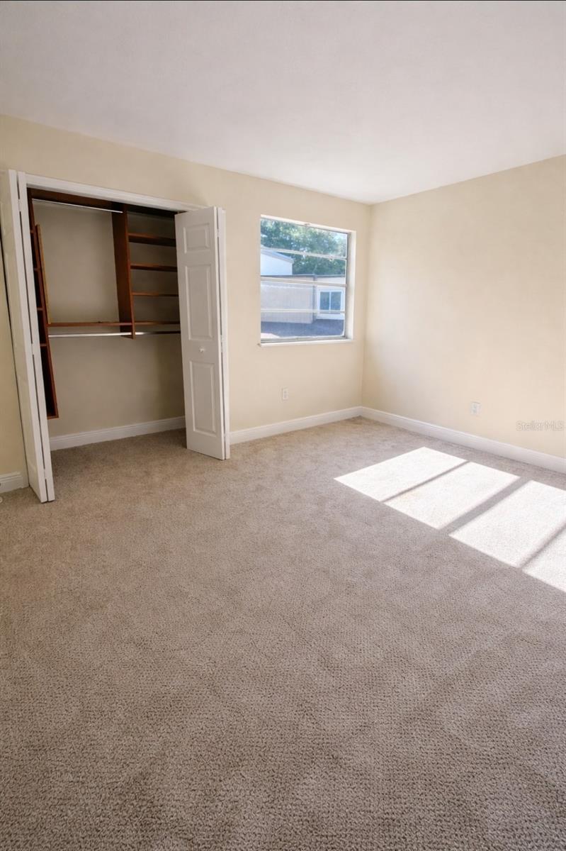 Landing looking at primary large bedroom bath to right