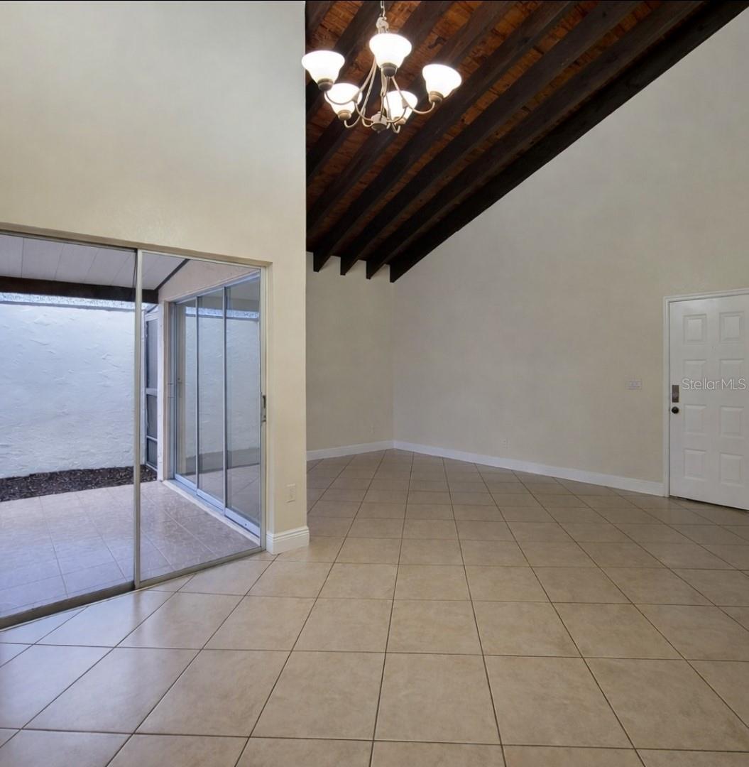 Living room with 20' vaulted ceiling