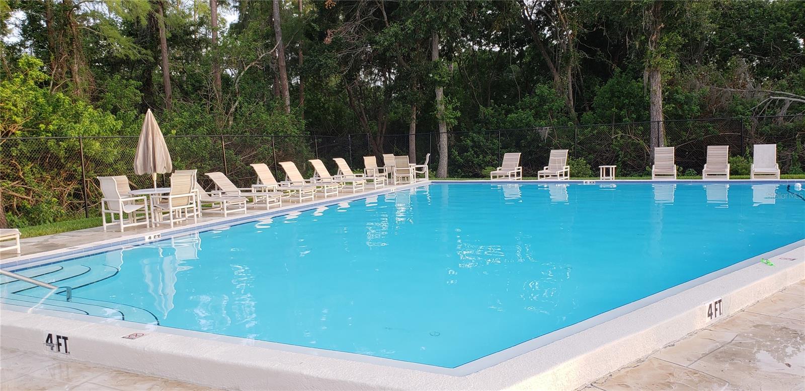 Plenty of chairs and umbrellas for shade.