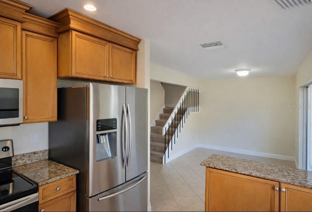 Kitchen leading to stairs