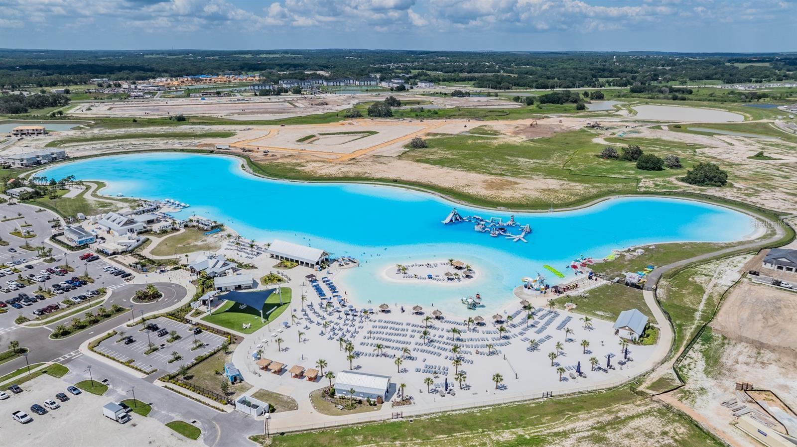 Sandy beaches are just across the street at the 15 acre lagoon
