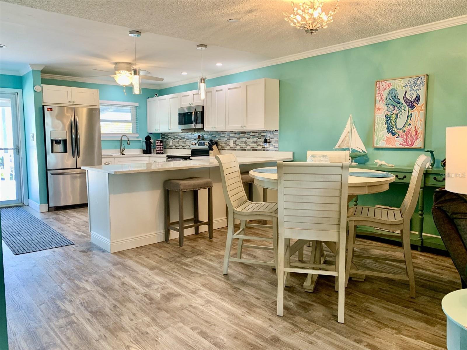 Looking back at dining room and kitchen