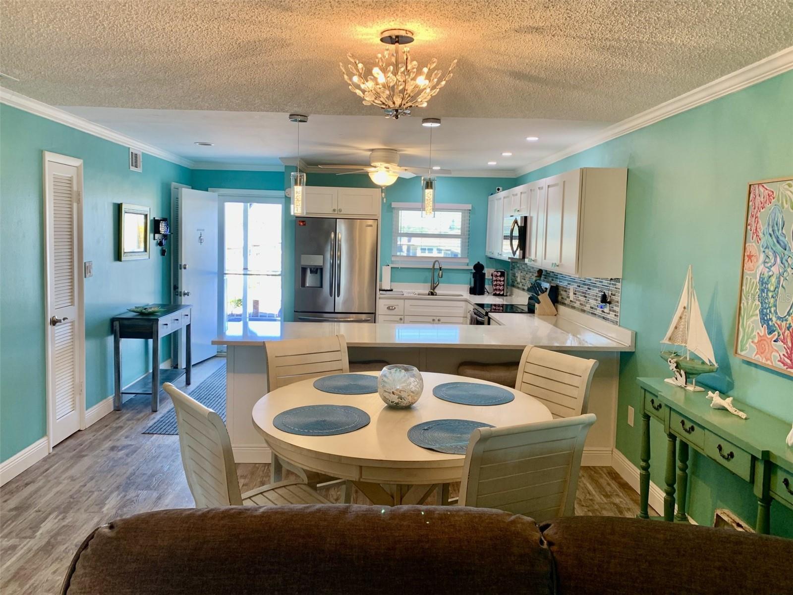 Looking back at dining room and kitchen