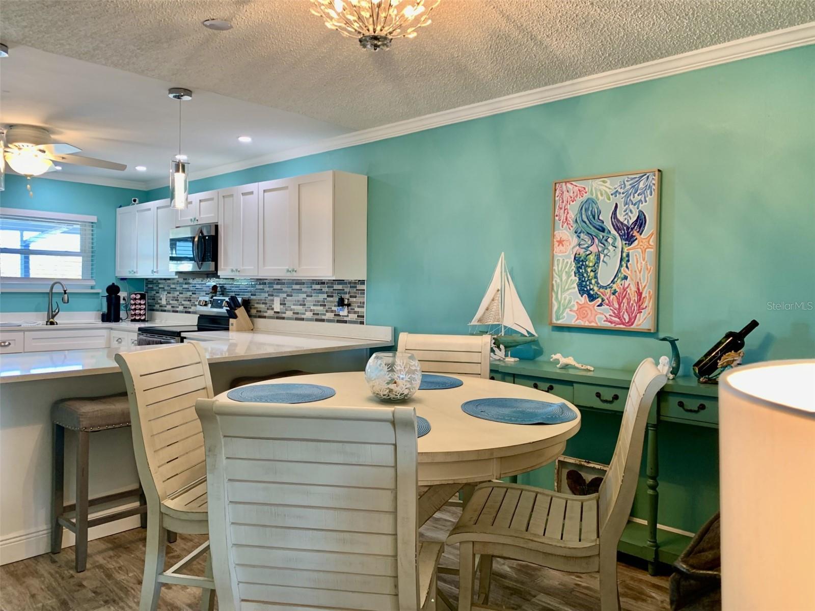 Looking back at dining room and kitchen