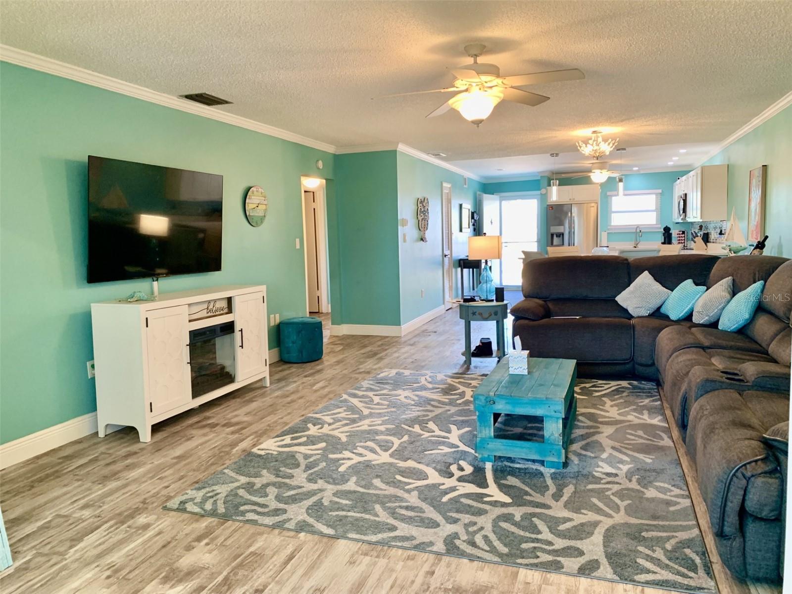 View from Florida room towards living, dining and kitchen