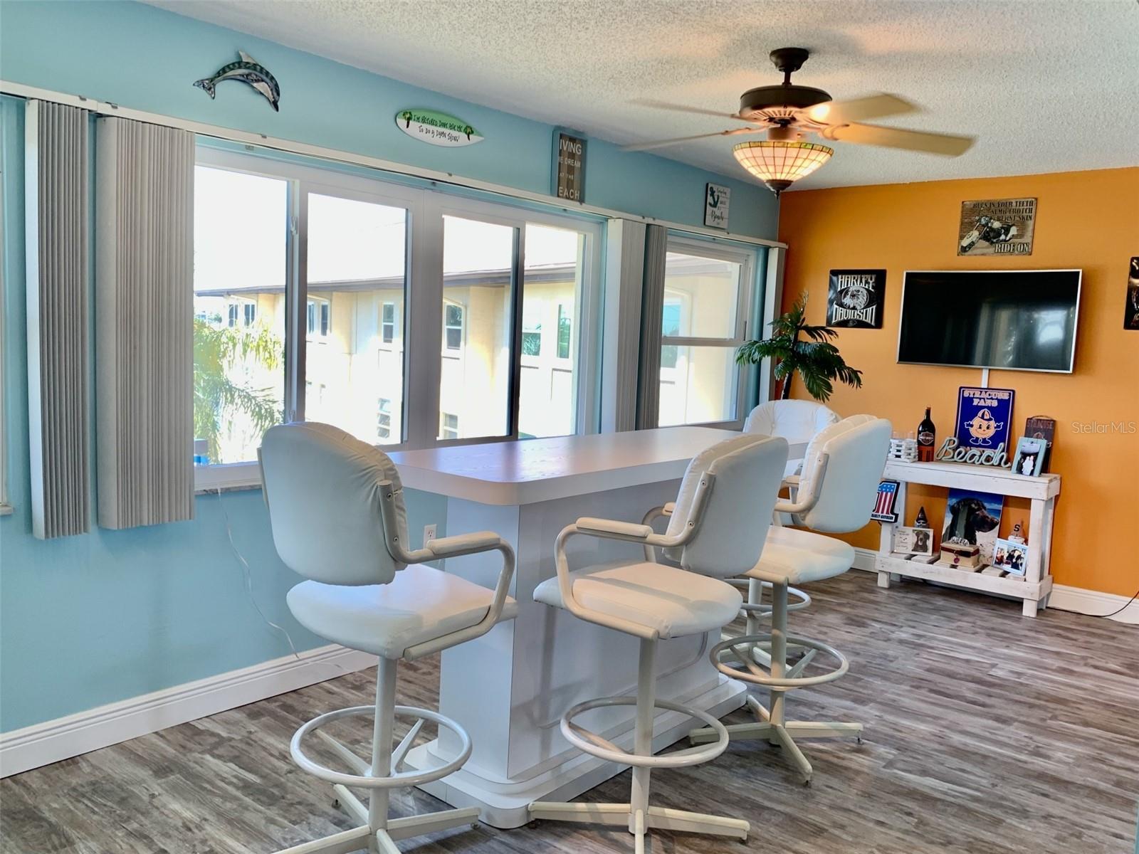 Florida room overlooks the canal to the Gulf