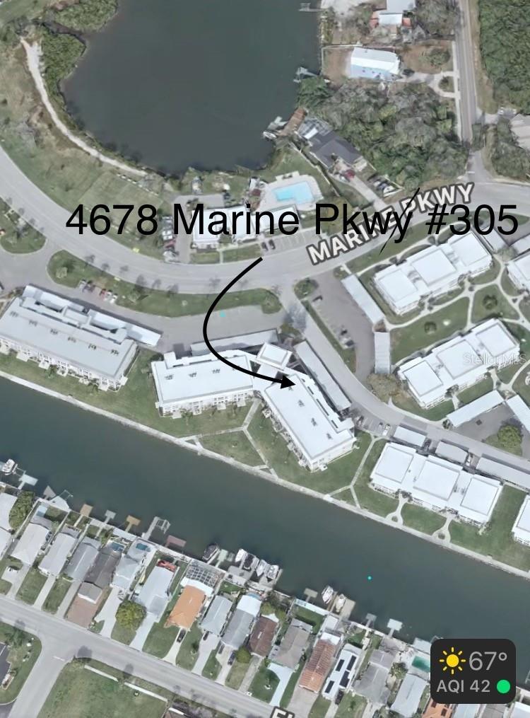 Your new canal front condo faces south west for the best sunsets. Pool and recreation center is across the street