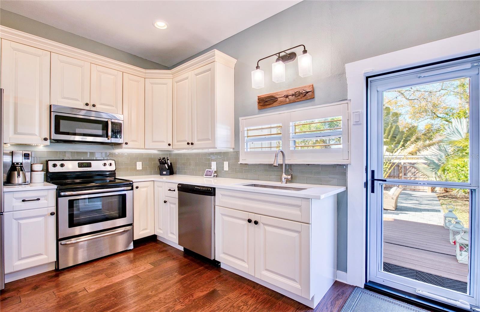 Glass door leads to patio and laundry room just off the kitchen.