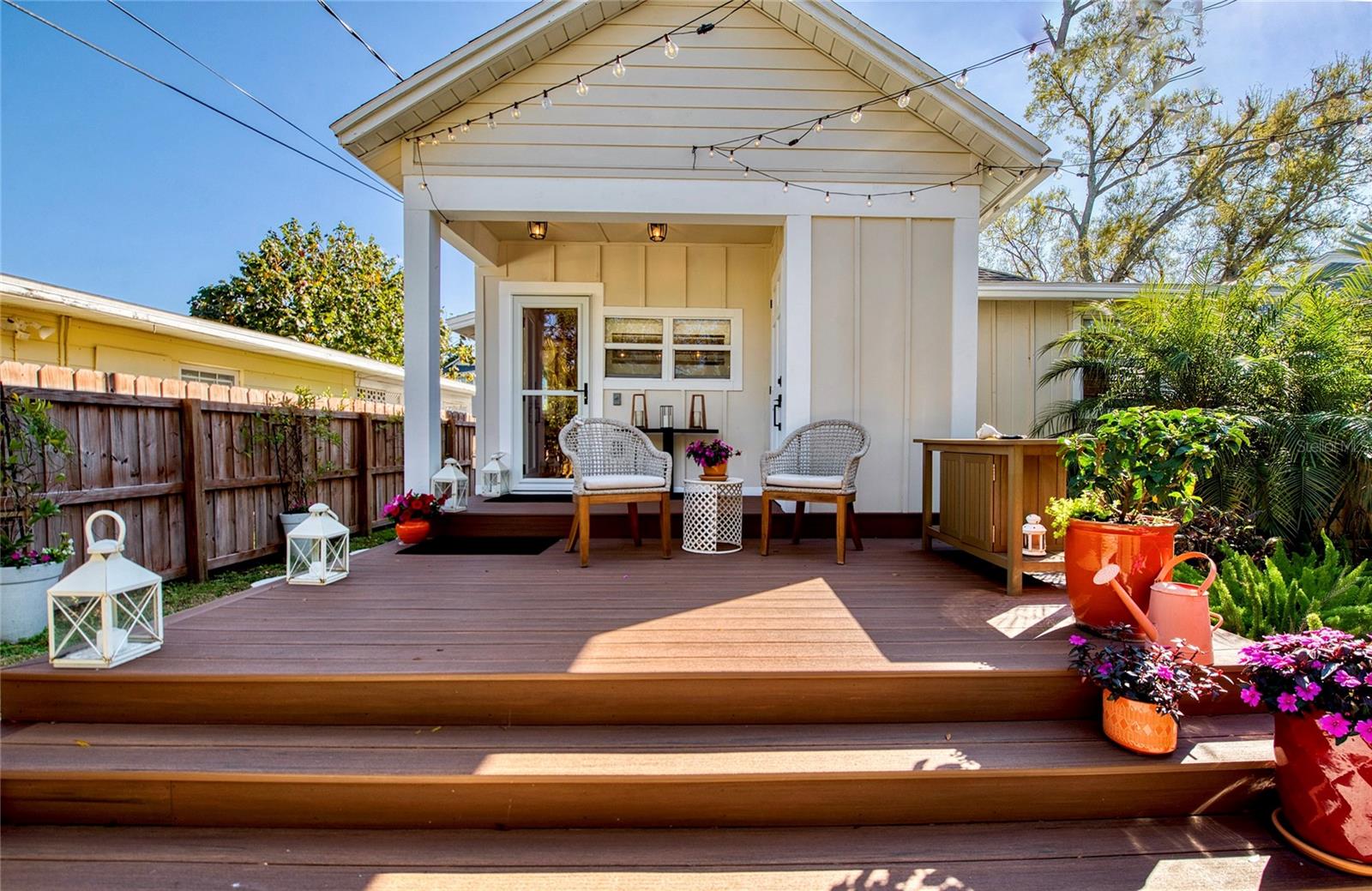Spacious raised wooden deck offers shade, sunshine and so many entertaining opportunities.