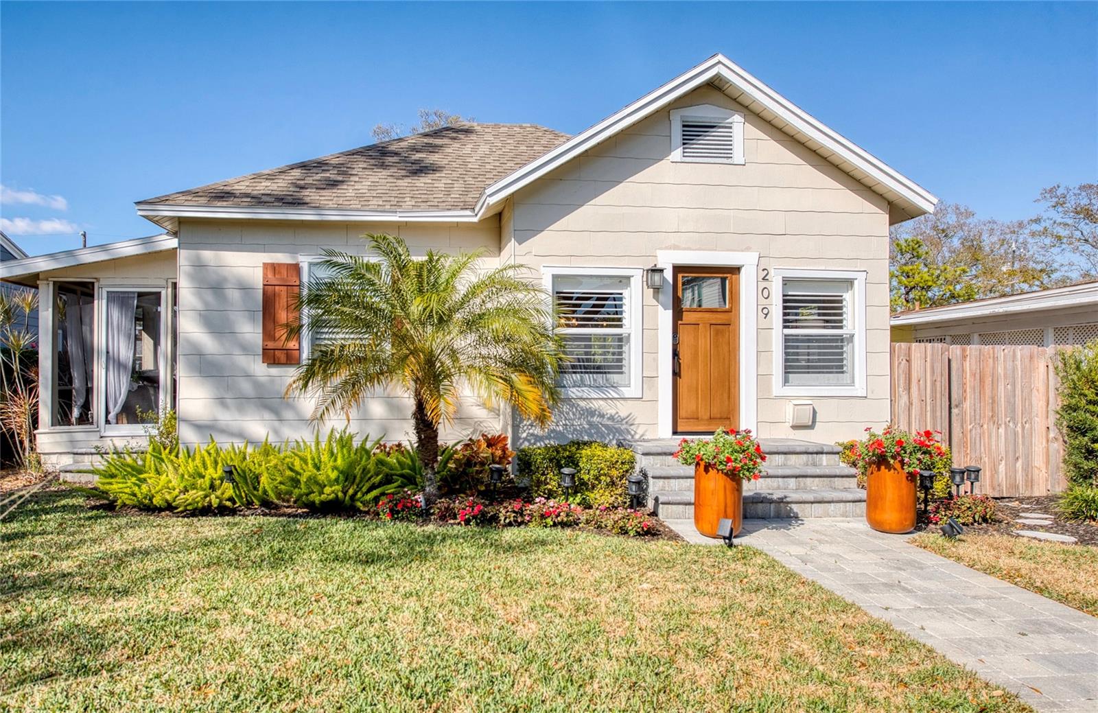 The home’s southern front exposure fills the interior with warm, inviting sunlight.