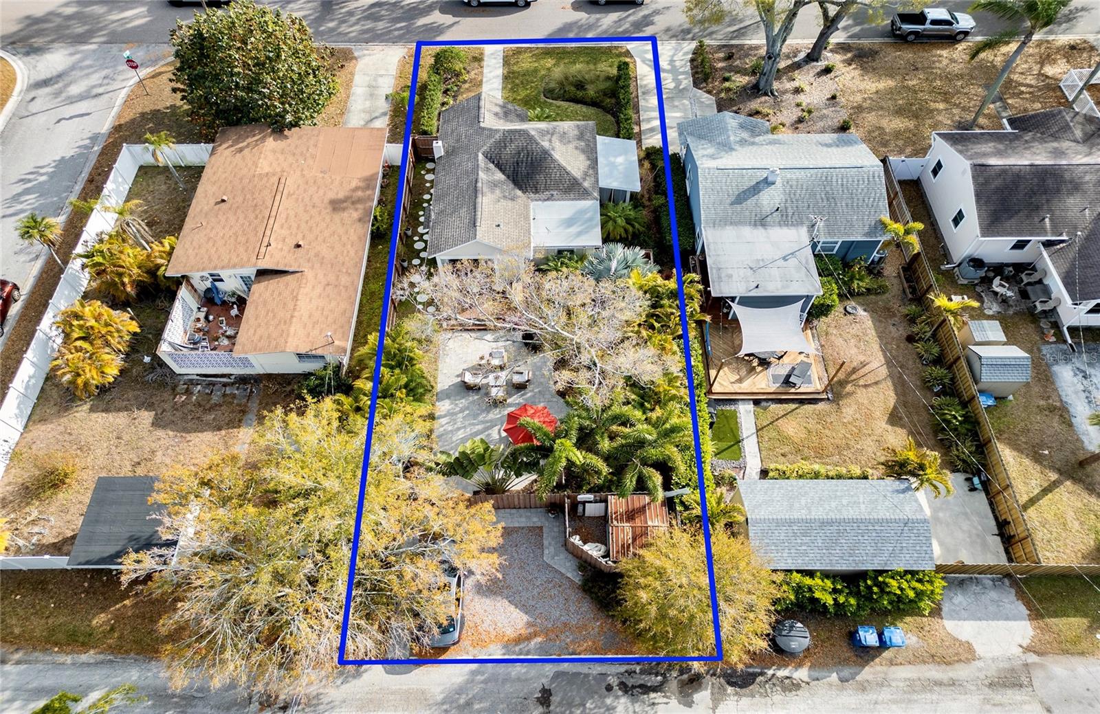 Private parking pad on North side (back) of lot provides space for 2+ cars