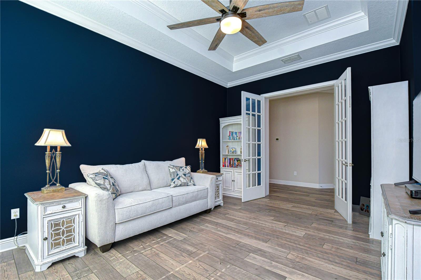 Tray ceilings and glass French doors!