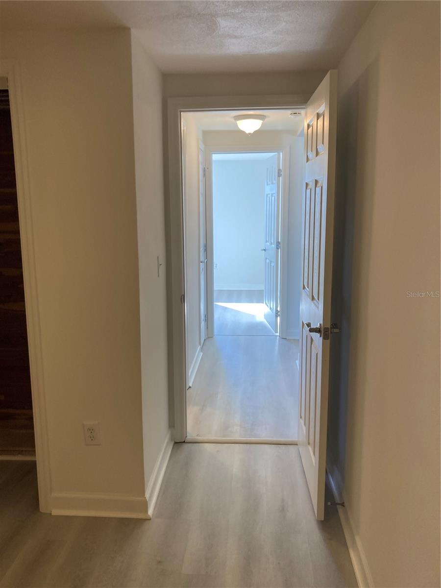 VIEW FROM 2ND BEDROOM TO F/BR