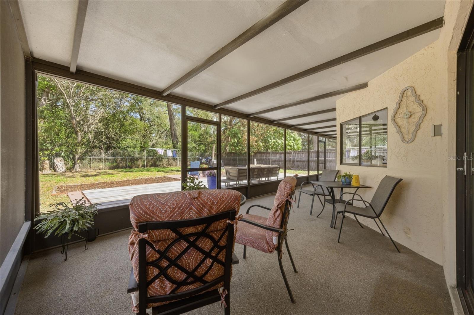 extra large covered and screened lanai area