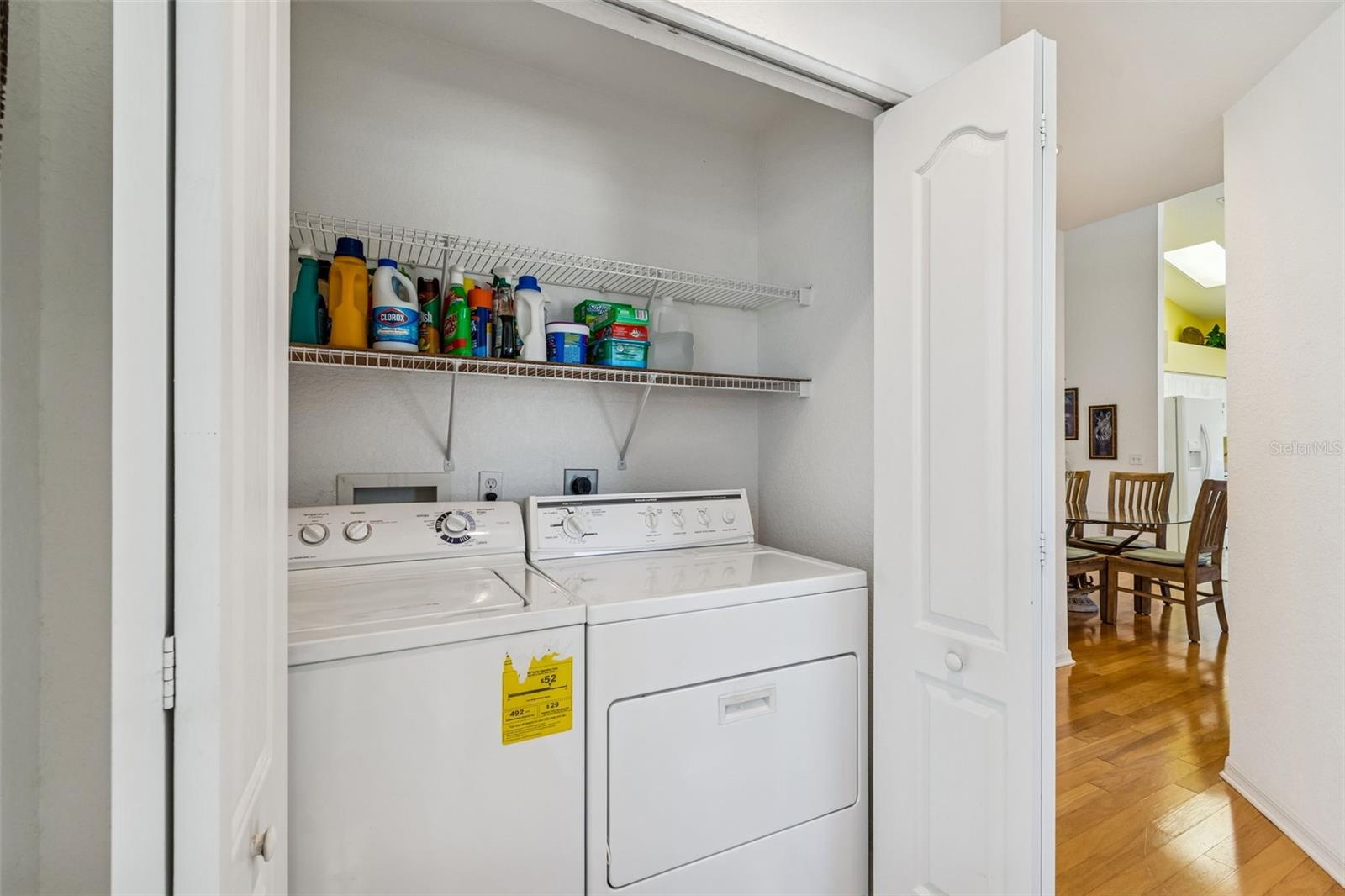 Closet laundry next to bedrooms