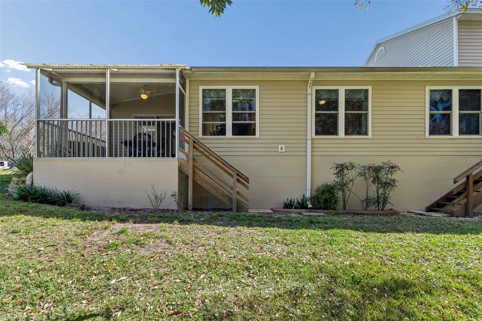 Wooden stairway to back yard