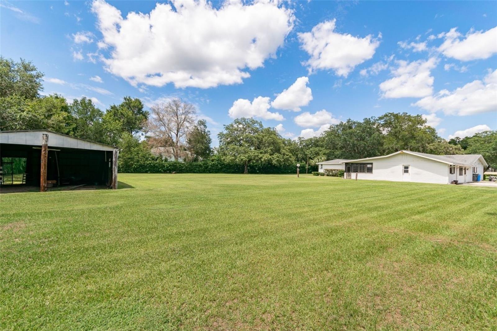 Rear boundary perspective highlighting barn and open grounds