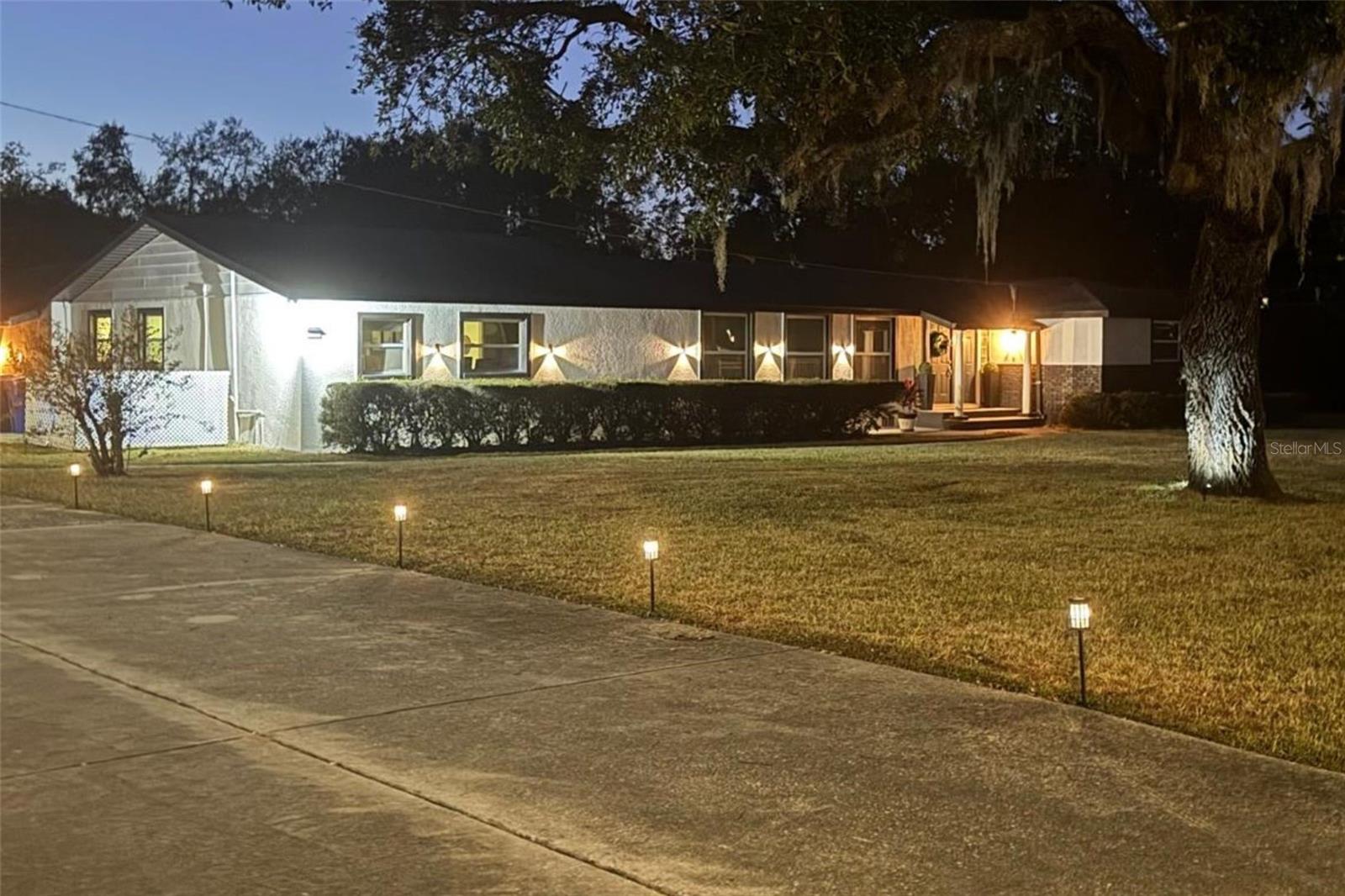 Evening view of side front exterior