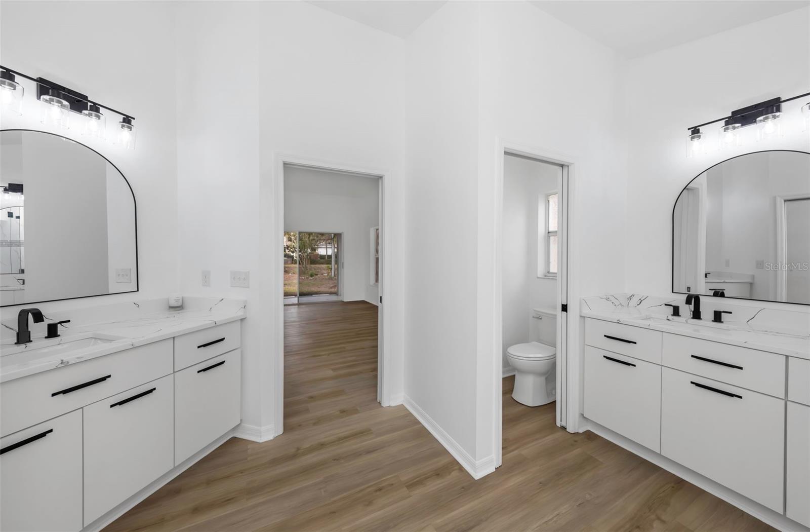 Double vanities, private water closet