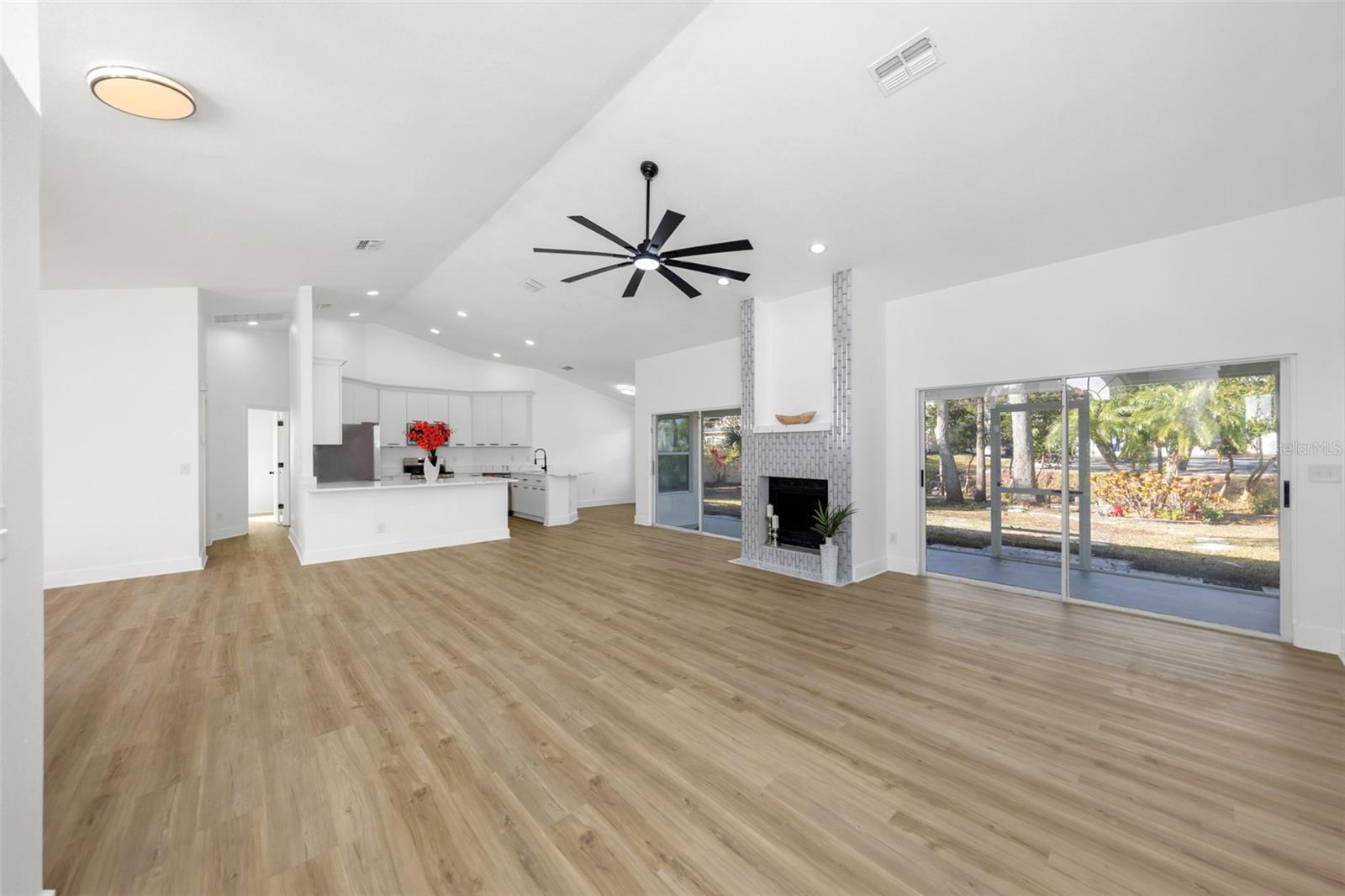 Light and airy open floor plan, Luxury vinyl plank flooring throughout