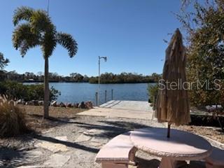 View of wood deck and Oyster Bay from back door