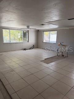 Kitchen/laundry space - lots of windows!