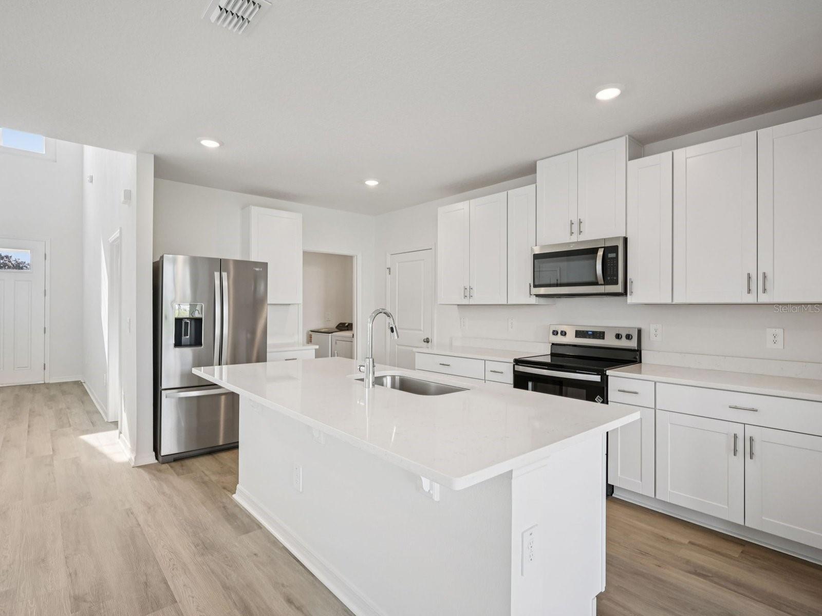 Interior photos are not of the actual home but are photos of the builder home with the same floorplan with similar interior finishes and features.