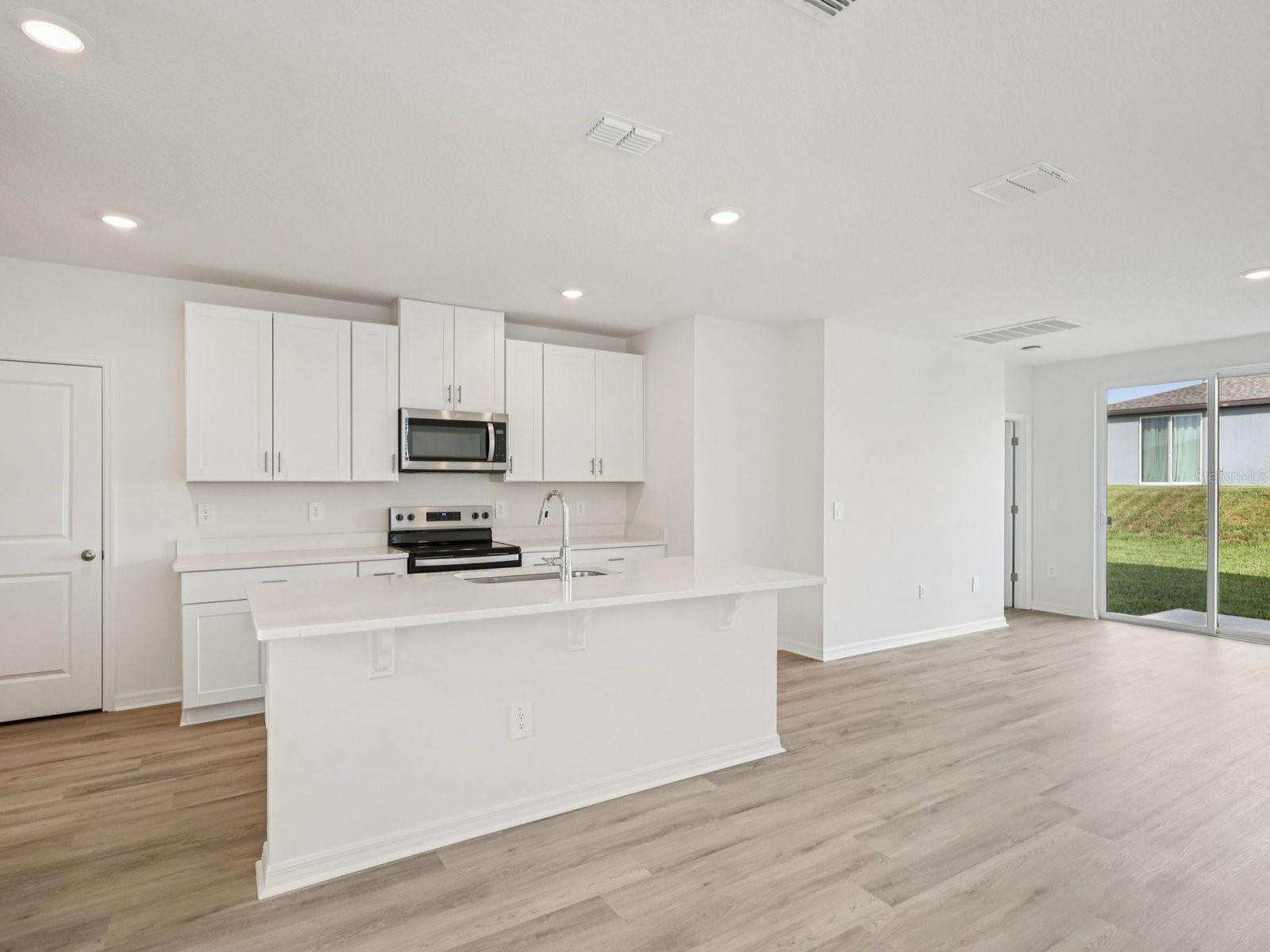 Interior photos are not of the actual home but are photos of the builder home with the same floorplan with similar interior finishes and features.