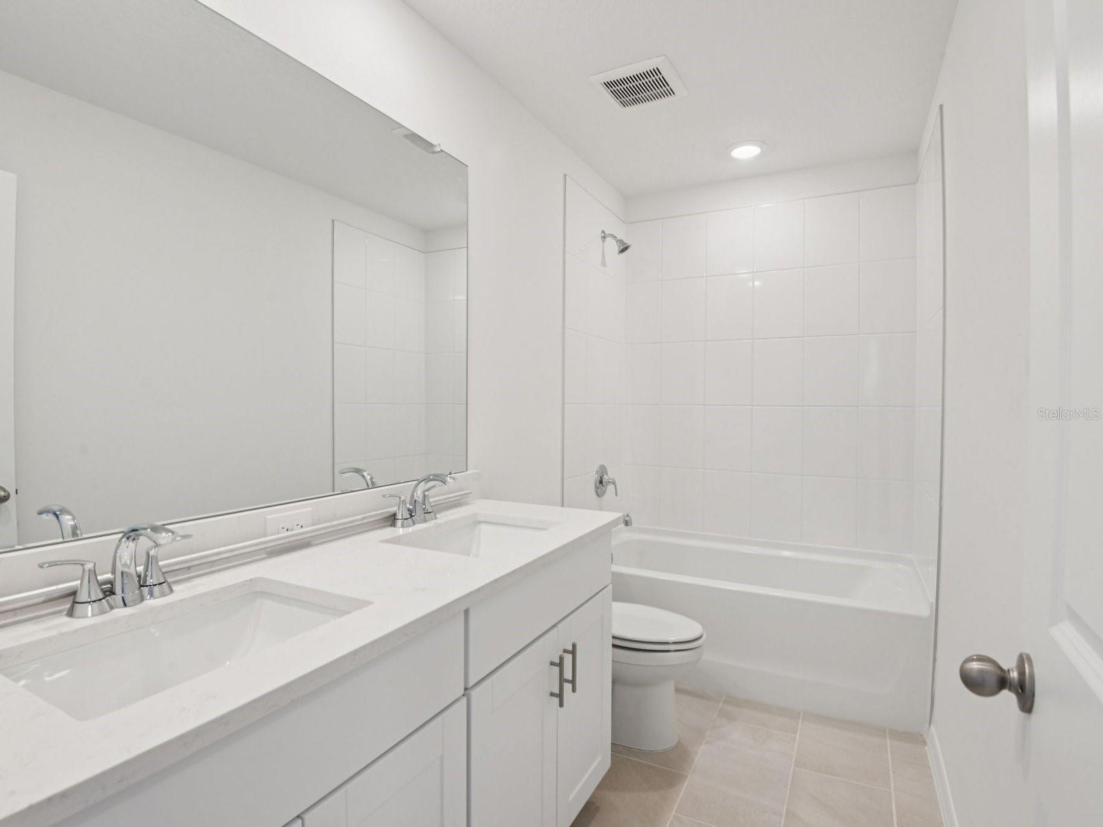 Interior photos are not of the actual home but are photos of the builder home with the same floorplan with similar interior finishes and features.