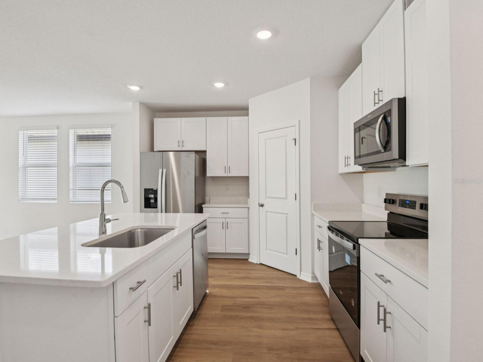 Interior photos are not of the actual home but are photos of the builder home with the same floorplan with similar interior finishes and features.