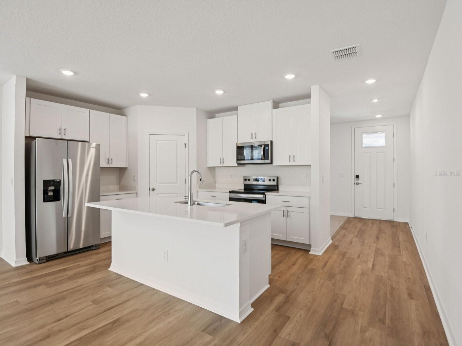 Interior photos are not of the actual home but are photos of the builder home with the same floorplan with similar interior finishes and features.