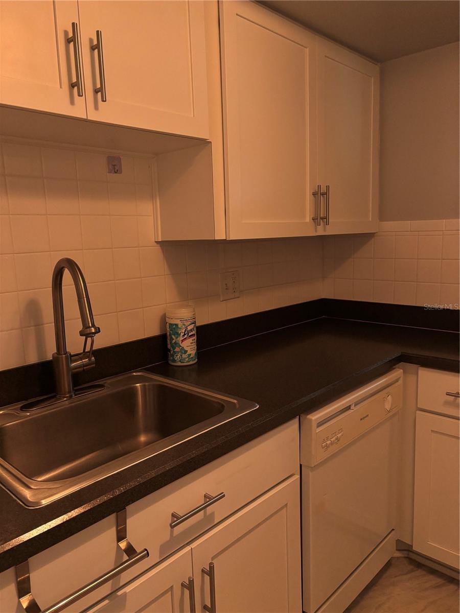 Updated kitchen with newer white cabinets