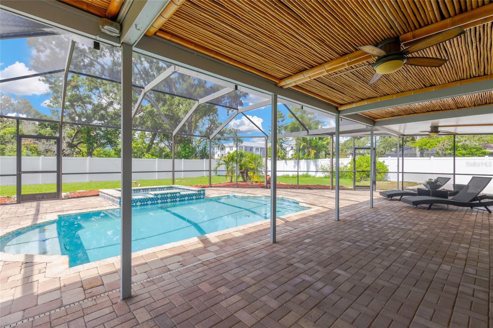 Screened pool and spa ready for year-round enjoyment!