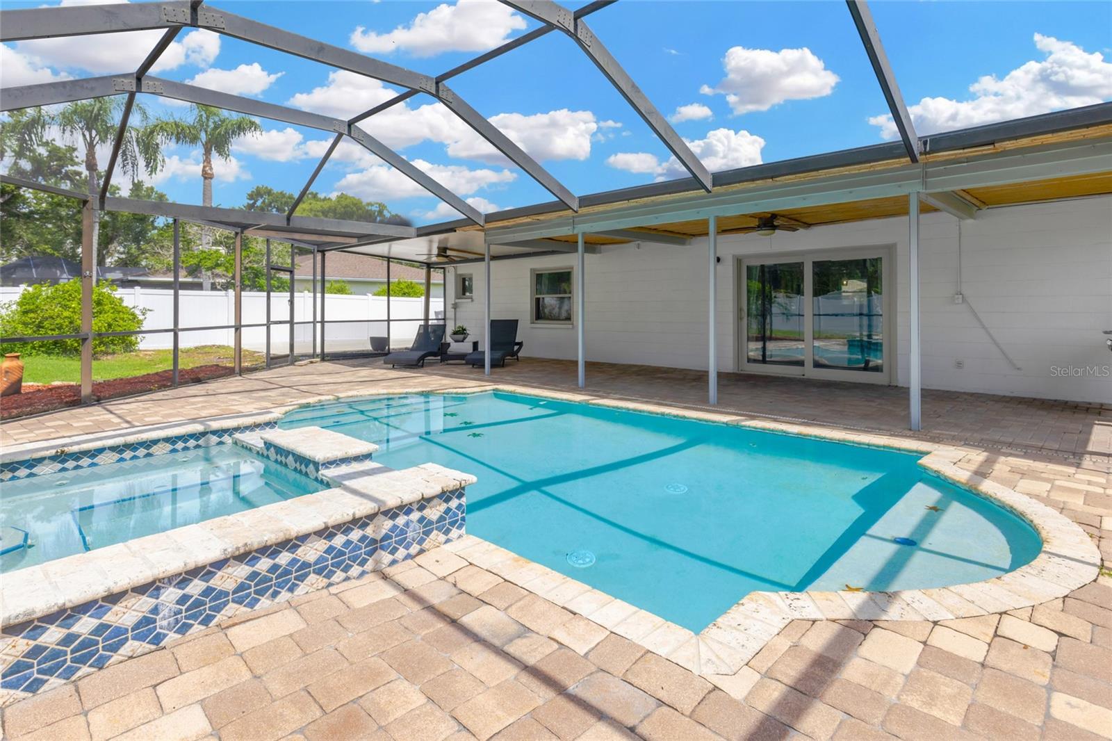 Decorative tile inlay adds character to the pool area!