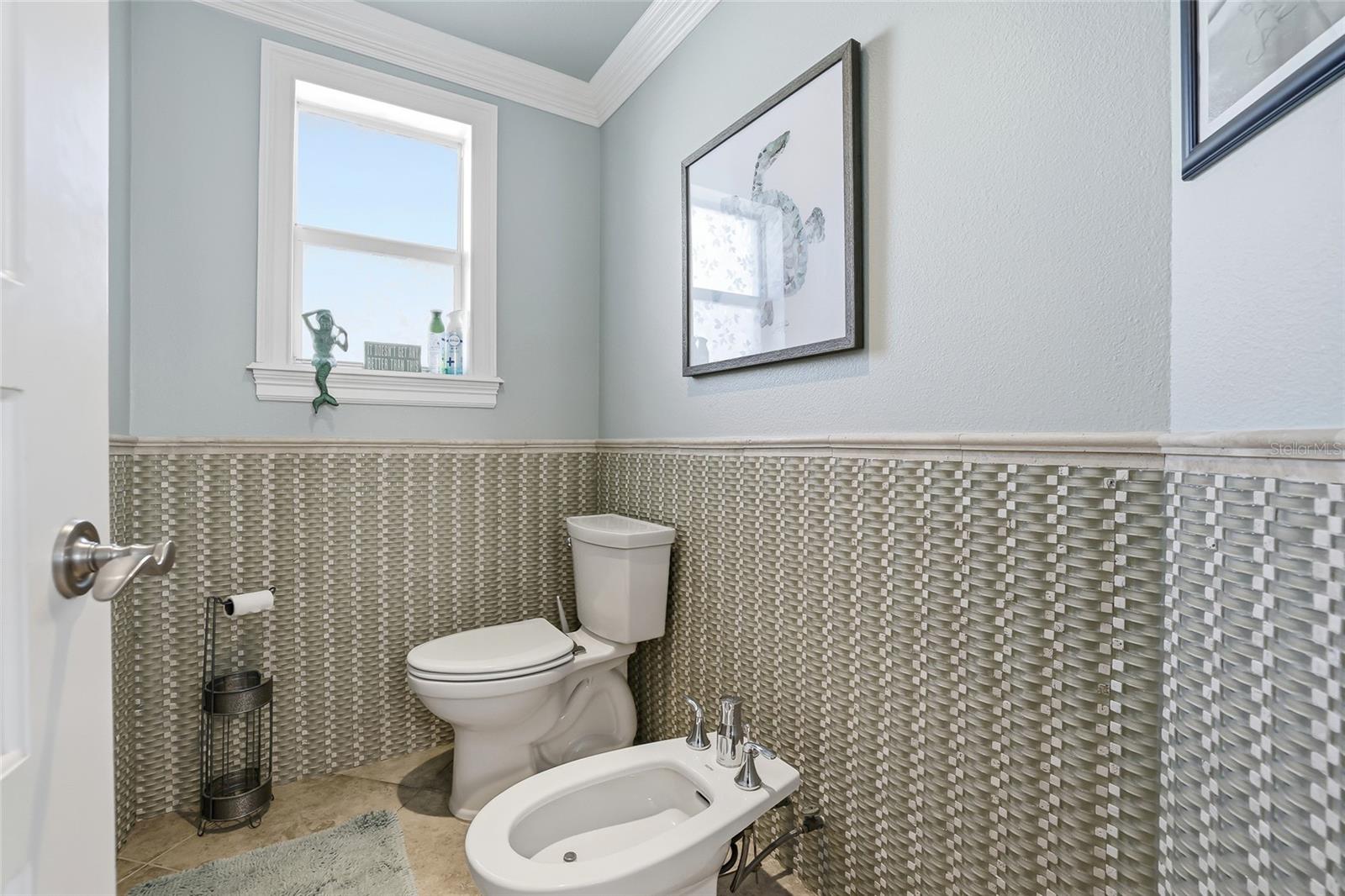 Water closet in master bathroom
