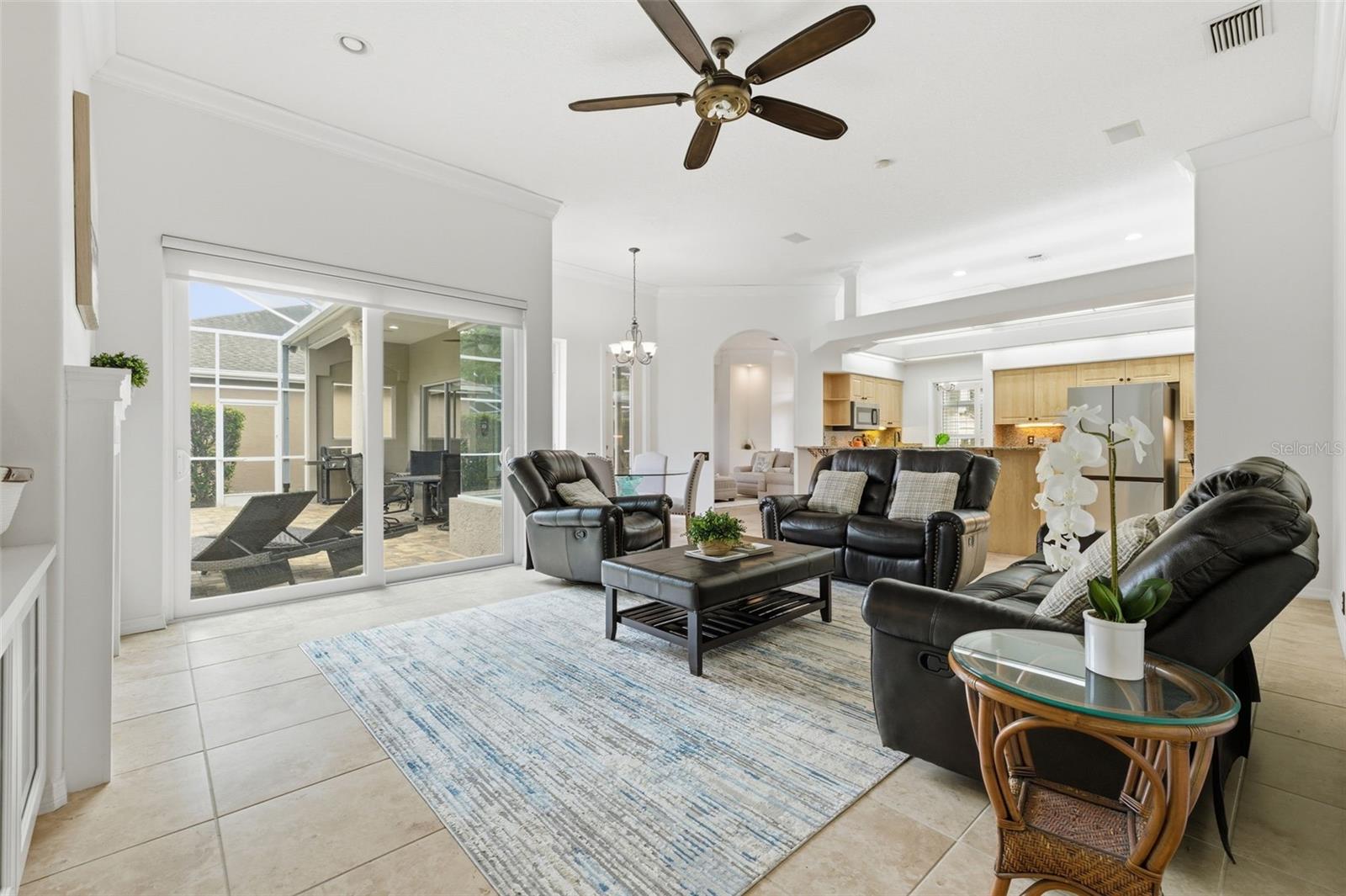 Main living area with new slider out to pool deck.