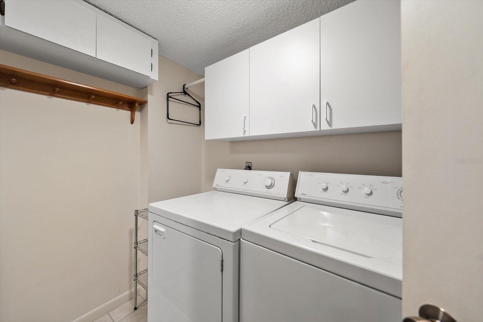 Spacious laundry room with plenty of storage