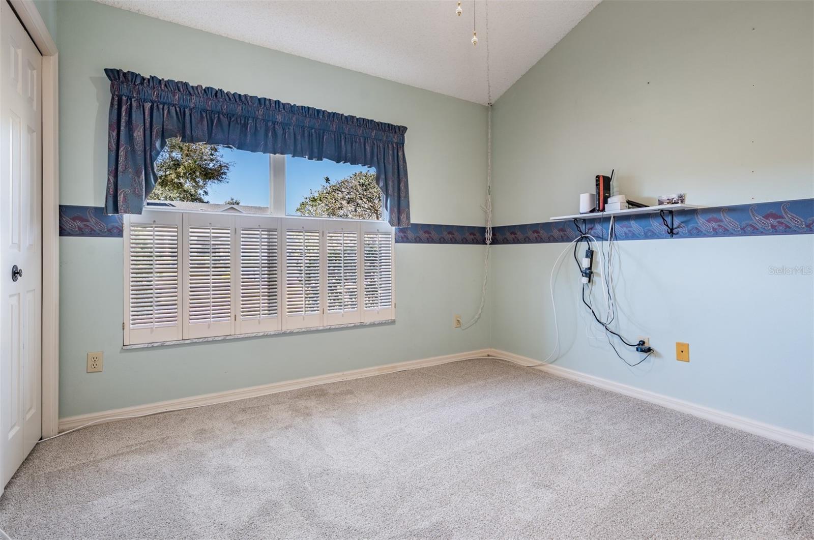 5th bedroom set up as office/den at front of home