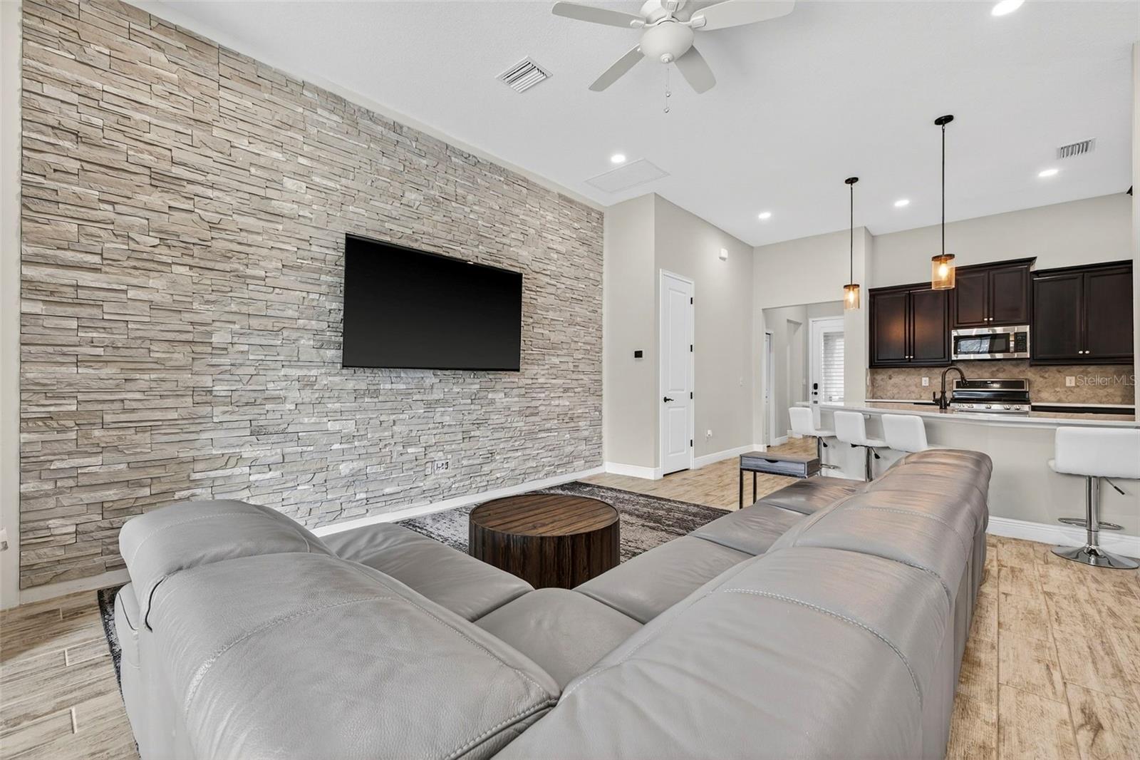 Living room with stone decorative wall
